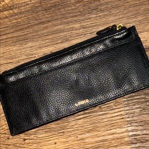 Lodis Textured Black Leather Clutch
